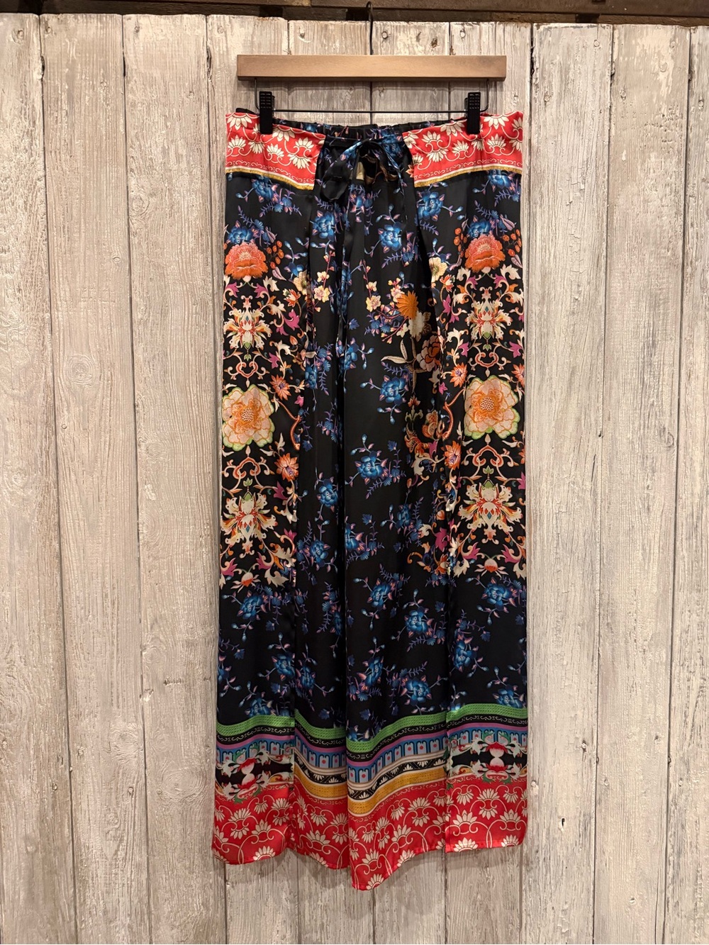Simon Chang Black Floral pants flowy wrap and tie at waist